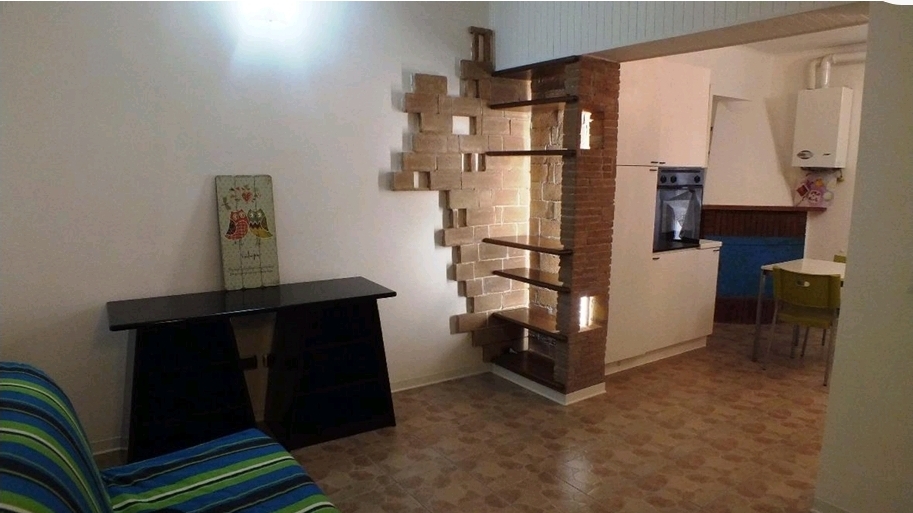 Zona giorno con camino CV013